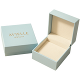 Elegant light blue Avielle Jewelry gift box with open interior on beige background, luxury minimalist packaging.
