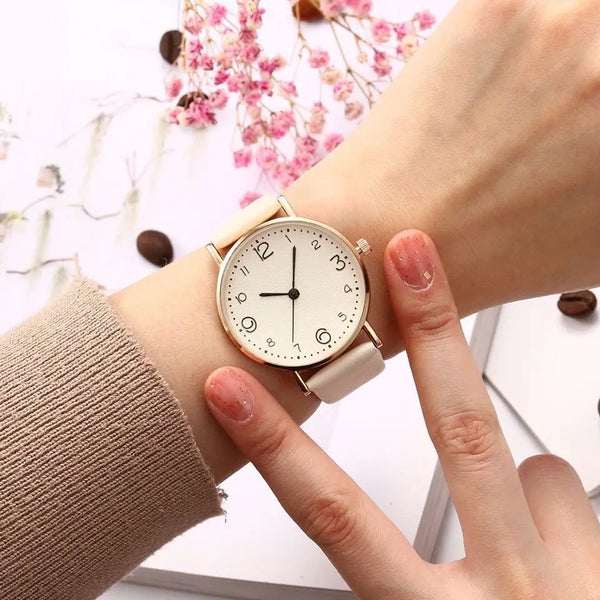 women’s leather strap analog watch close-up