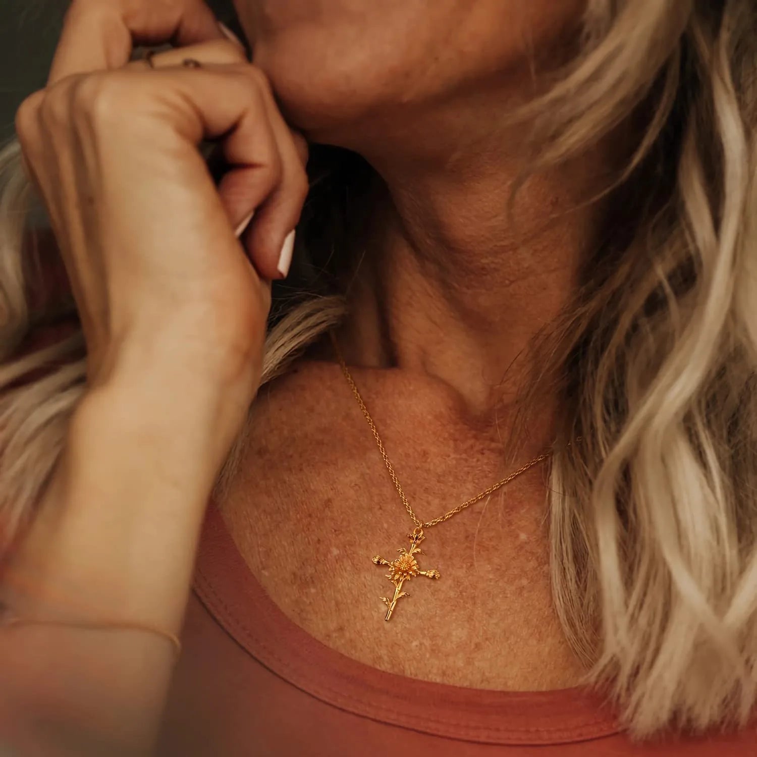 personalized gold birth flower jewelry on model