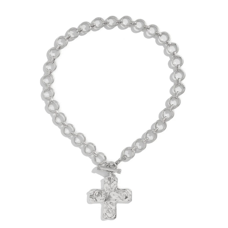 modern industrial cross pendant close-up