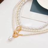 three strand pearl necklace on model