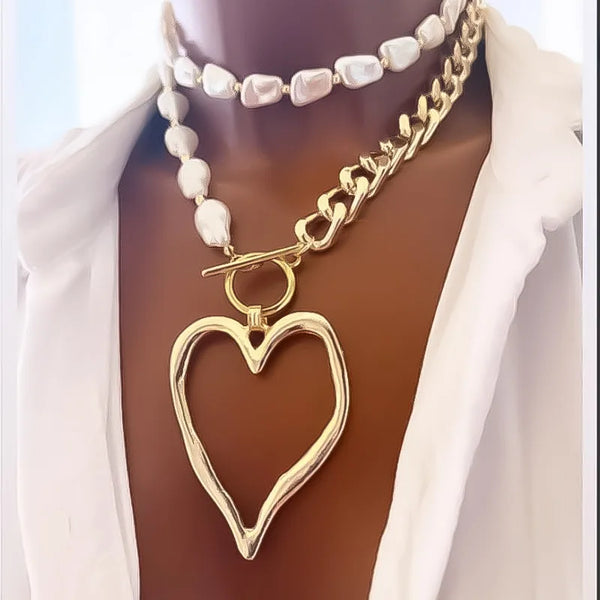 Baroque pearl heart pendant necklace close-up