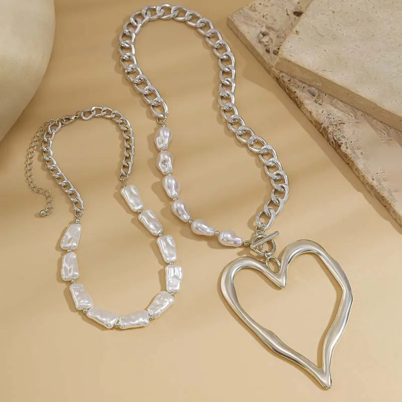 Baroque pearl heart pendant necklace close-up